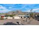 Single story home with a large driveway and mountain views at 7501 N 22Nd Pl, Phoenix, AZ 85020