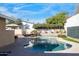 Stunning kidney-shaped pool with a large patio area at 7501 N 22Nd Pl, Phoenix, AZ 85020