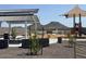 Community playground with covered picnic tables and play area at 7689 W Smoketree Dr, Peoria, AZ 85383