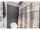 Clean bathroom with updated shower and toilet at 7945 W Wethersfield Rd, Peoria, AZ 85381