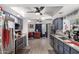 Bright kitchen with granite countertops and breakfast nook at 7945 W Wethersfield Rd, Peoria, AZ 85381