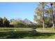 Scenic pond with mountain view and lush landscaping at 7950 E Camelback Rd # 512, Scottsdale, AZ 85251