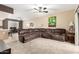 Spacious living room with a large sectional sofa and carpet at 900 S 94Th St # 1001, Chandler, AZ 85224