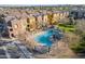 Community swimming pool with surrounding lounge chairs and landscaping at 900 S 94Th St # 1066, Chandler, AZ 85224