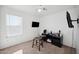 Bedroom with two stools, TV, and gaming console at 9089 W Troy Dr, Arizona City, AZ 85123