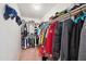 Well-organized walk-in closet with ample shelving and hanging space at 9089 W Troy Dr, Arizona City, AZ 85123