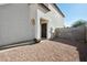 Front entrance with a dark brown door and stone accents at 9089 W Troy Dr, Arizona City, AZ 85123