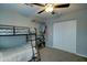 Cozy bedroom with bunk beds, ample closet space, and ceiling fan at 9136 E Plata Ave, Mesa, AZ 85212