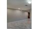 Spacious hallway with neutral walls and tile flooring at 9136 E Plata Ave, Mesa, AZ 85212