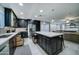 Modern kitchen with stainless steel appliances and large island at 9136 E Plata Ave, Mesa, AZ 85212