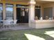 Private patio with seating area and grassy backyard at 9707 E Mountain View Rd # 1430, Scottsdale, AZ 85258