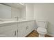 Bright bathroom with white cabinets and quartz countertop at 9920 W Calle Encorvada --, Phoenix, AZ 85037