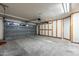 Attached garage with extra storage cabinets at 9920 W Calle Encorvada --, Phoenix, AZ 85037