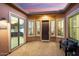 Private courtyard with seating area and access to kitchen at 12935 W Lone Tree Trl, Peoria, AZ 85383