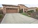 Spacious driveway leading to a two-car garage at 12935 W Lone Tree Trl, Peoria, AZ 85383