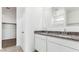 Bathroom with double vanity, granite countertop and large mirror at 1531 E Lardner Dr, Casa Grande, AZ 85122