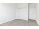Bright bedroom with double door closet and neutral carpeting at 1531 E Lardner Dr, Casa Grande, AZ 85122