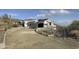 Under construction home with stucco exterior and large windows at 16025 N Ringtail Trl, Fountain Hills, AZ 85268