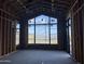 Living room under construction with large window and mountain view at 16025 N Ringtail Trl, Fountain Hills, AZ 85268