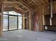 Living room under construction with large windows and high ceilings at 16025 N Ringtail Trl, Fountain Hills, AZ 85268
