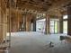 Spacious living room with large windows and fireplace under construction at 16025 N Ringtail Trl, Fountain Hills, AZ 85268