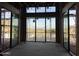 Large living room with expansive windows offering scenic views at 16025 N Ringtail Trl, Fountain Hills, AZ 85268