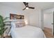 Cozy bedroom with ceiling fan, neutral decor, and a large closet at 1915 E Hidalgo Ave, Phoenix, AZ 85040