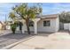 Single story home with a carport and front yard landscaping at 1915 E Hidalgo Ave, Phoenix, AZ 85040