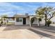 Newly remodeled home with carport and attractive landscaping at 1915 E Hidalgo Ave, Phoenix, AZ 85040