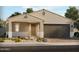 Single-story home with a two-car garage and desert landscaping at 202 S 176Th Ave, Goodyear, AZ 85338