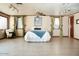 Bright bedroom with tiled floors and neutral decor at 2157 W Mulberry Dr, Phoenix, AZ 85015