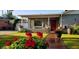 House exterior with red door and landscaped yard at 2157 W Mulberry Dr, Phoenix, AZ 85015