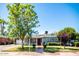 Charming single story home with landscaped lawn and walkway at 2157 W Mulberry Dr, Phoenix, AZ 85015
