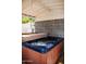 Hot tub with cover under covered patio structure at 2157 W Mulberry Dr, Phoenix, AZ 85015