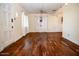 Hardwood floors and view into another room from living room at 2157 W Mulberry Dr, Phoenix, AZ 85015