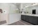 Modern bathroom with double vanity and large shower at 23363 S 228Th Pl, Queen Creek, AZ 85142