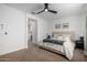 Well-lit bedroom with ensuite bathroom access at 23363 S 228Th Pl, Queen Creek, AZ 85142