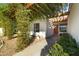 Inviting entrance with a pergola and brick pathway at 2604 E Downing Cir, Mesa, AZ 85213