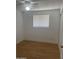 Simple bedroom with wood-look floors and ceiling fan at 2802 N 50Th Ln, Phoenix, AZ 85035