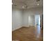 Light and airy living room with wood-look floors and access to exterior at 2802 N 50Th Ln, Phoenix, AZ 85035