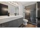 Modern bathroom with hexagon tile shower and gray vanity at 2928 E Cortez St, Phoenix, AZ 85028