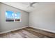 Bright bedroom with ceiling fan and large window at 2928 E Cortez St, Phoenix, AZ 85028