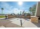 Outdoor BBQ area with grills and seating, overlooking the golf course at 3056 E Palm Beach Dr, Chandler, AZ 85249