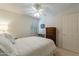 Comfortable bedroom with a queen-size bed and window shutters at 3056 E Palm Beach Dr, Chandler, AZ 85249