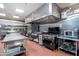 Well-equipped commercial kitchen with stainless steel appliances at 3056 E Palm Beach Dr, Chandler, AZ 85249