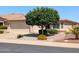 Charming single-story home with a well-manicured front yard and mature landscaping in a desirable neighborhood at 3056 E Palm Beach Dr, Chandler, AZ 85249