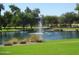 Landscaped lake with fountain in a community at 3056 E Palm Beach Dr, Chandler, AZ 85249