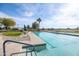 Community lap pool with a spa and lush landscaping at 3056 E Palm Beach Dr, Chandler, AZ 85249