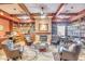 Inviting library with comfortable seating and a fireplace at 3056 E Palm Beach Dr, Chandler, AZ 85249