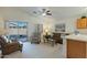 Living area with comfortable seating and access to patio at 3056 E Palm Beach Dr, Chandler, AZ 85249